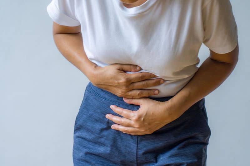 symptoms peptic ulcer woman